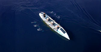 44west rowing boat at sea overhead