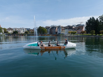 SGS x 44west boat on the lake in front of the fountain