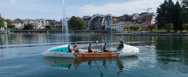 SGS x 44west boat on the lake in front of the fountain