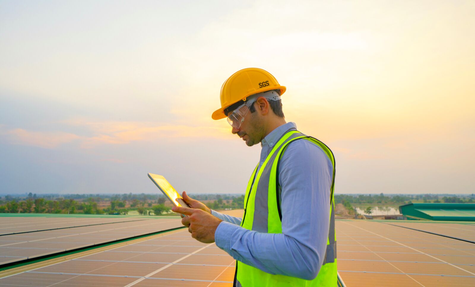 Engineer Inspecting Solar Panels