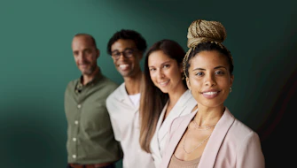 Impact Now group portraits on green background