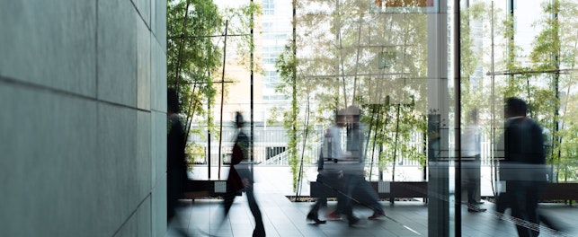 Business Persons Walking in a Urban Building