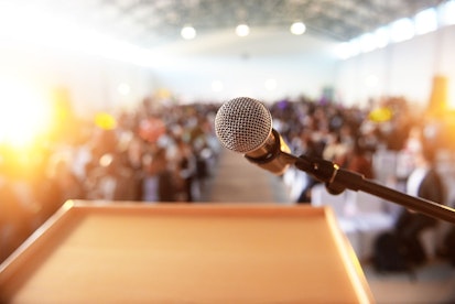 Microphone with Crowd in the Background