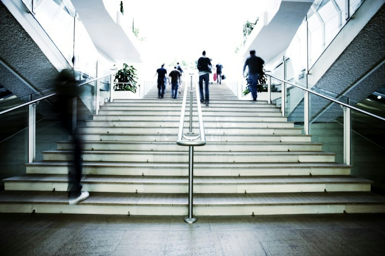 orig people walking in modern building