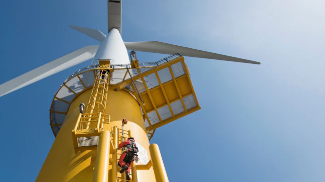 Engineer Climbing Wind Turbine