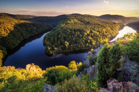 River Running Through Alpine Landscape