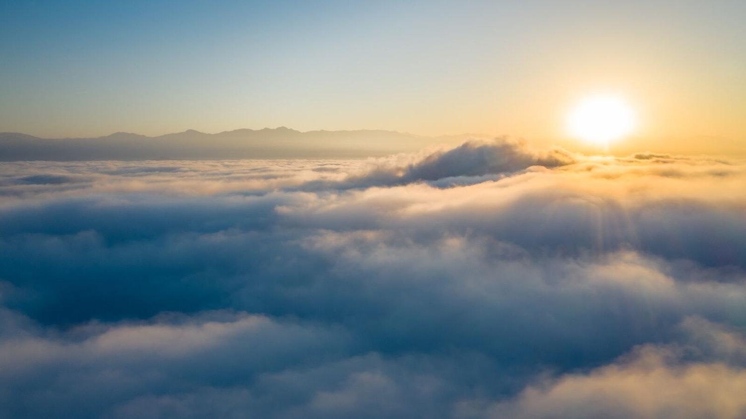 Aerial Shot of Clouds at Sunrise