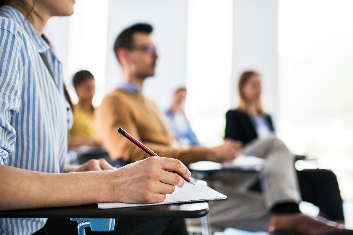 Group of People Having Training in a Class