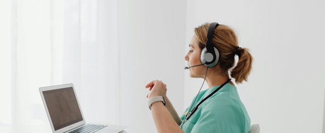 A Female Doctor Having a Video Call