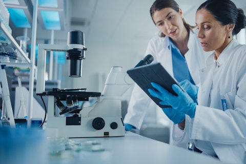 Researchers analysing data in a laboratory