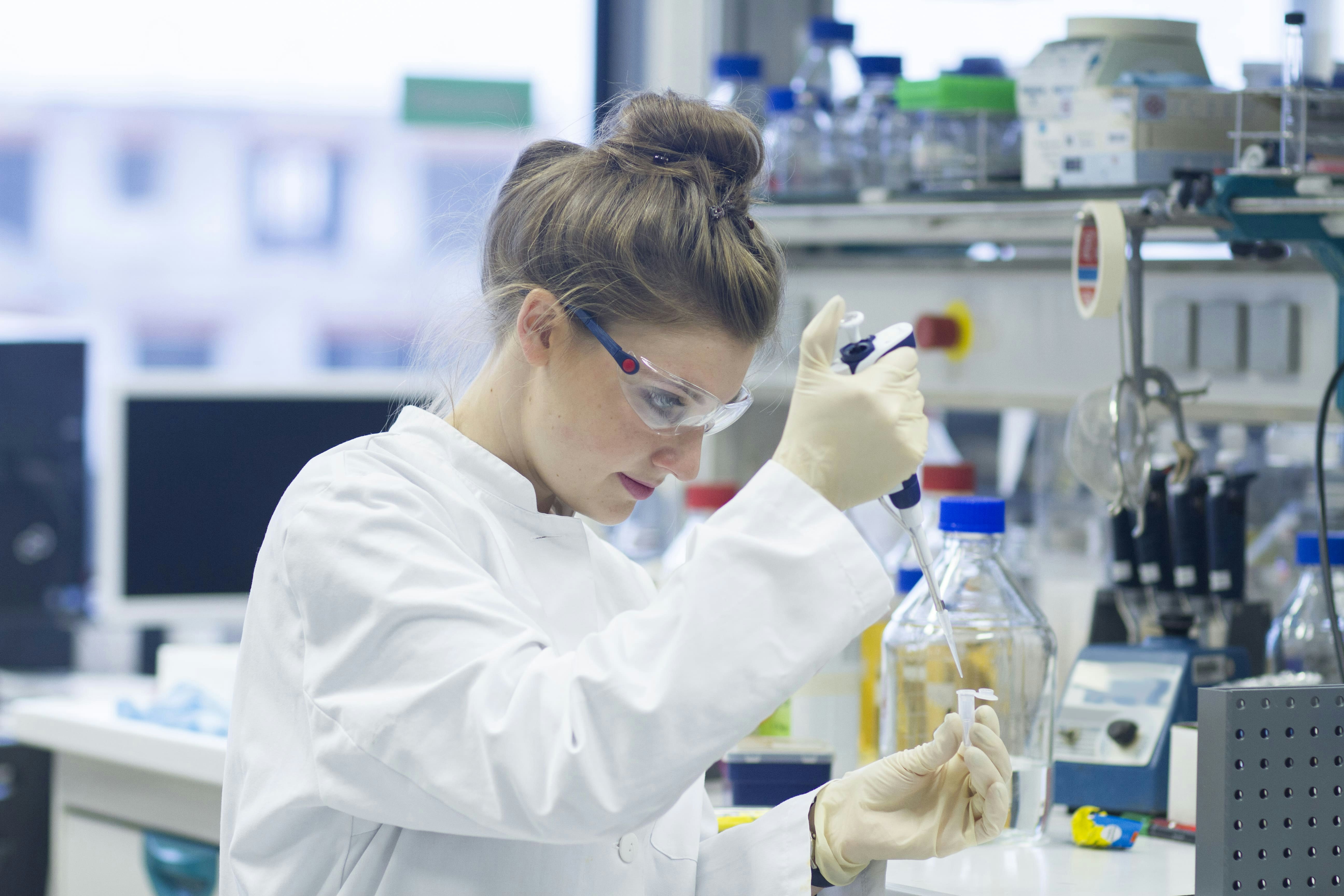 Biologist Testing some Samples in a Laboratory