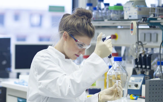 Biologist Testing some Samples in a Laboratory