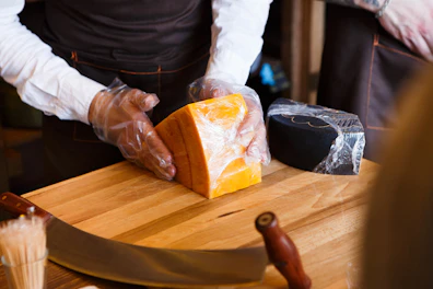 Cutting Cheese on Table