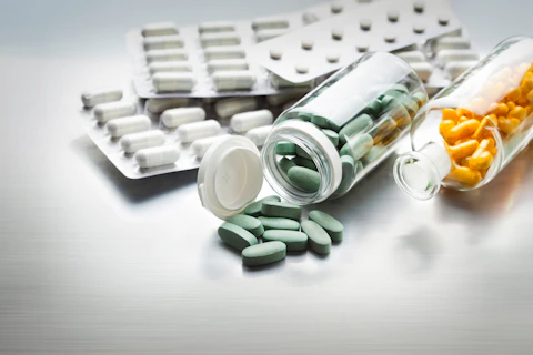 Different Medicines on a Gray Metal Table