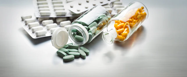 Different Medicines on a Gray Metal Table