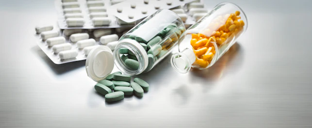 Different Medicines on a Gray Metal Table