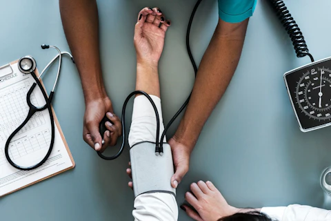 Doctor Taking Blood Pressure