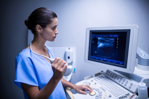 nurse performing a medical examination