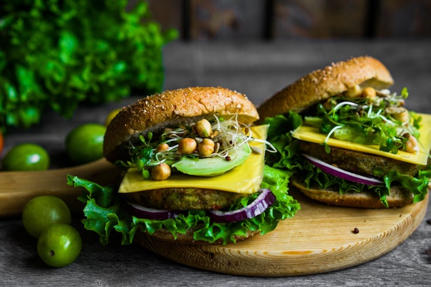 Healthy vegetarian burger on wooden background
