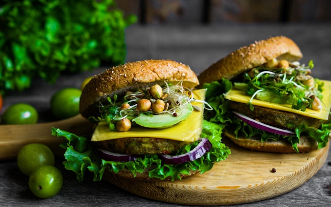 Healthy vegetarian burger on wooden background
