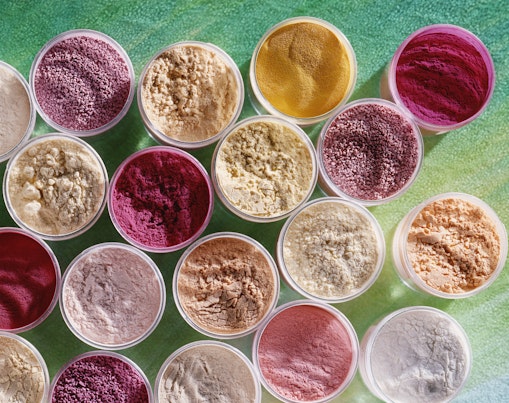 High-angle shot of food coloring powders