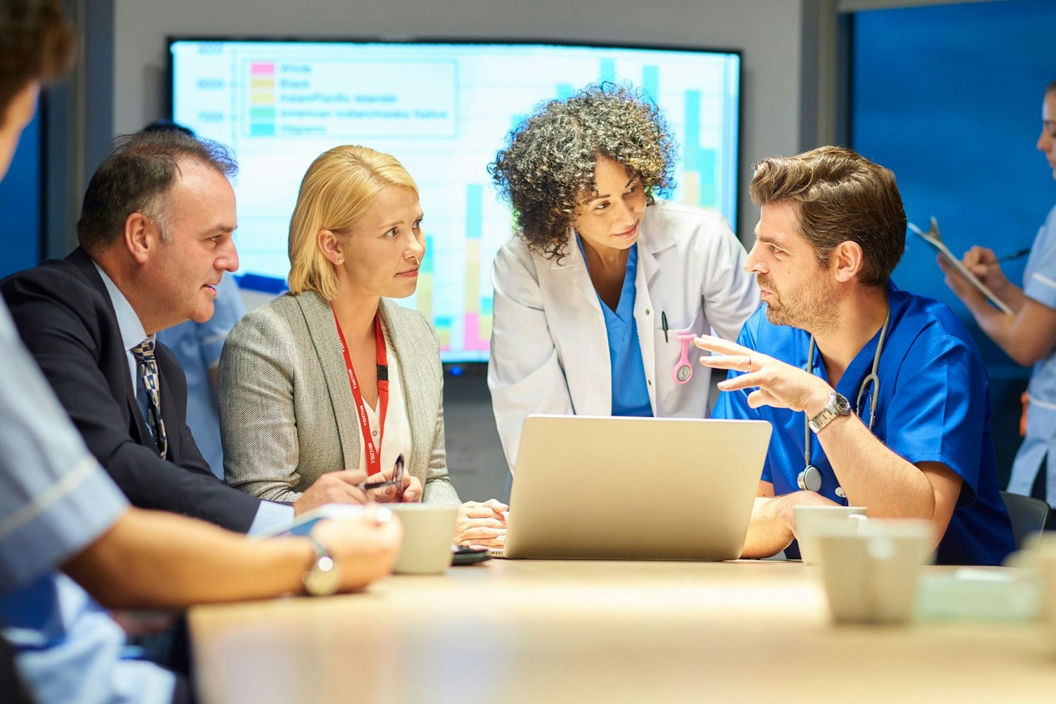 Mixed Group of Healthcare Professionals Discussing