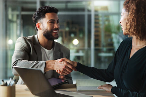 People smile and handshake in office for business company welcome and deal at tech Happy man woman a