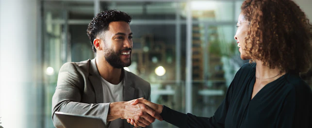 People smile and handshake in office for business company welcome and deal at tech Happy man woman a