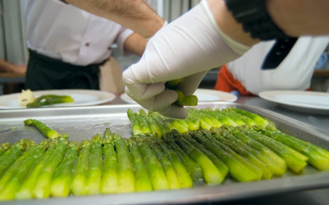 Preparation of an asparagus on kitchen at restaurant