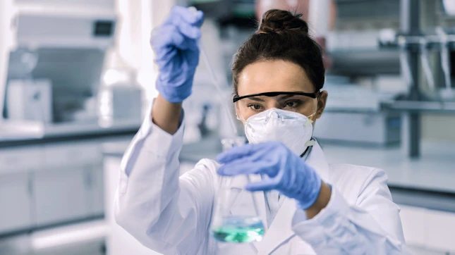 Scientist Testing Chemicals in a Laboratory