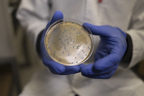 Scientist with Petri Dish