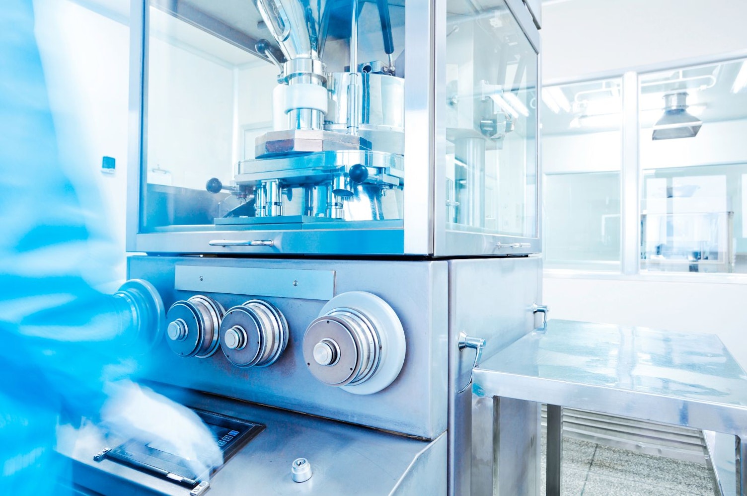 Scientists Working in Sterile Pharmaceutical Manufacturing Laboratory