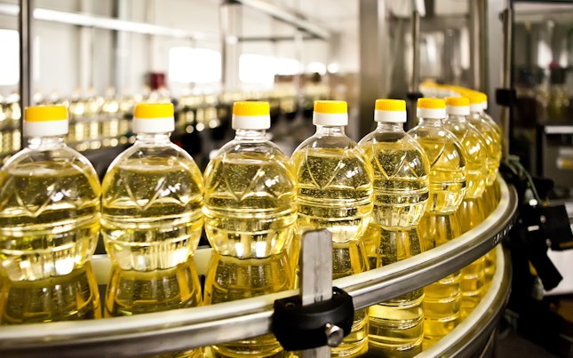 Sunflower Oil in the Bottle Moving on Production Line