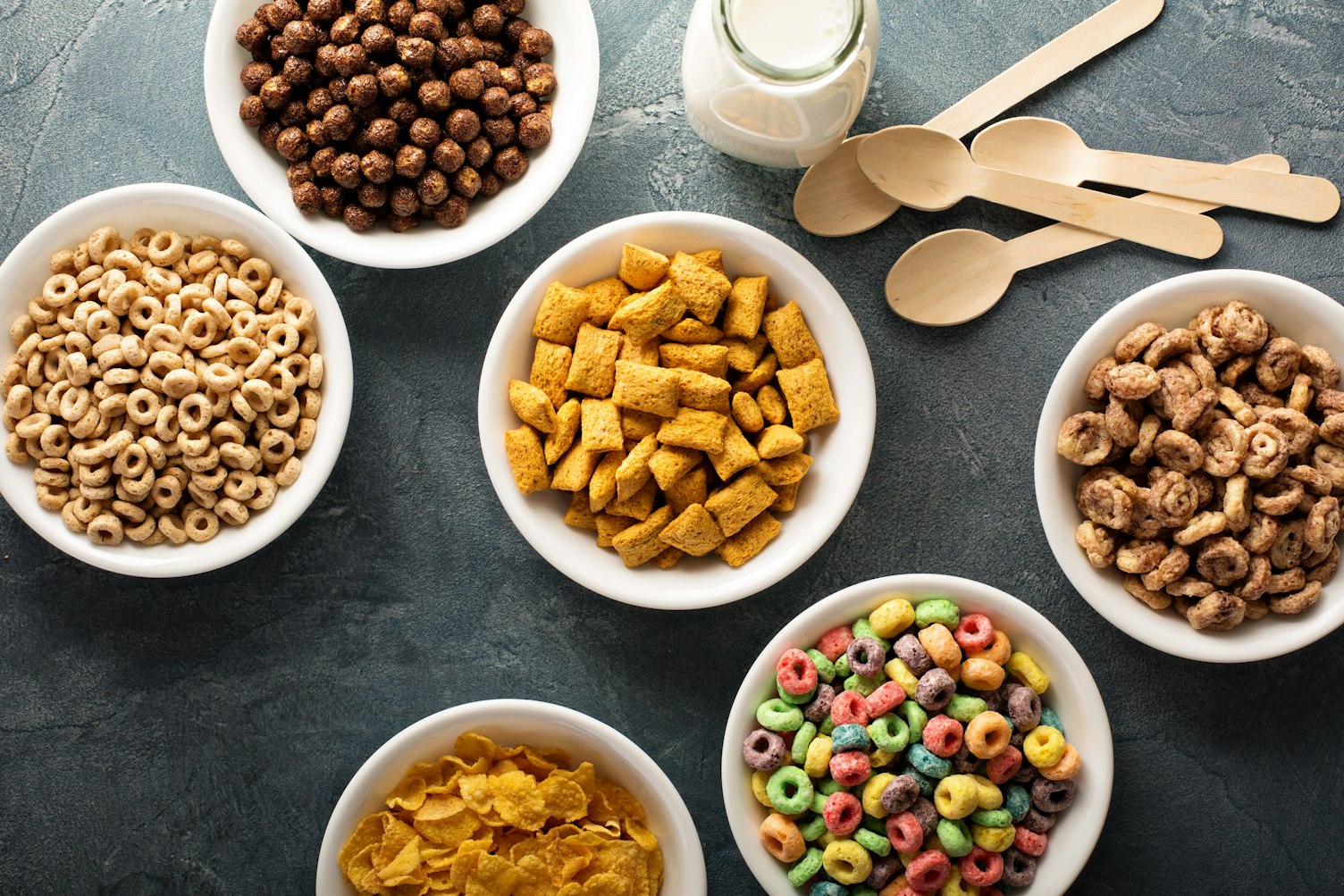 Variety of Cold Cereals in White Bowls