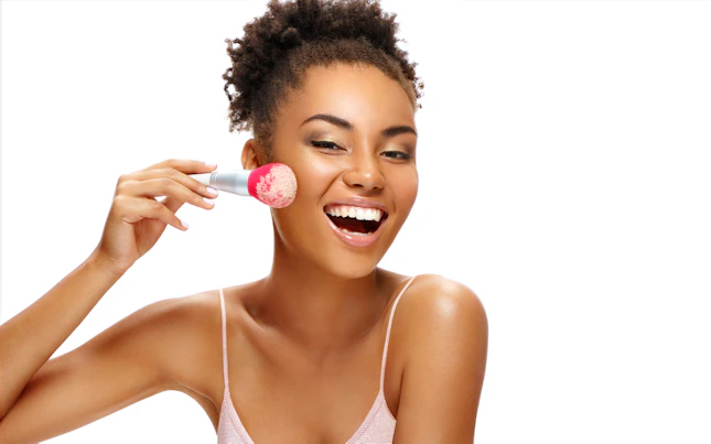 Woman applying make up