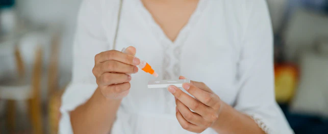 Woman Doing Covid 19 Rapid Self Test