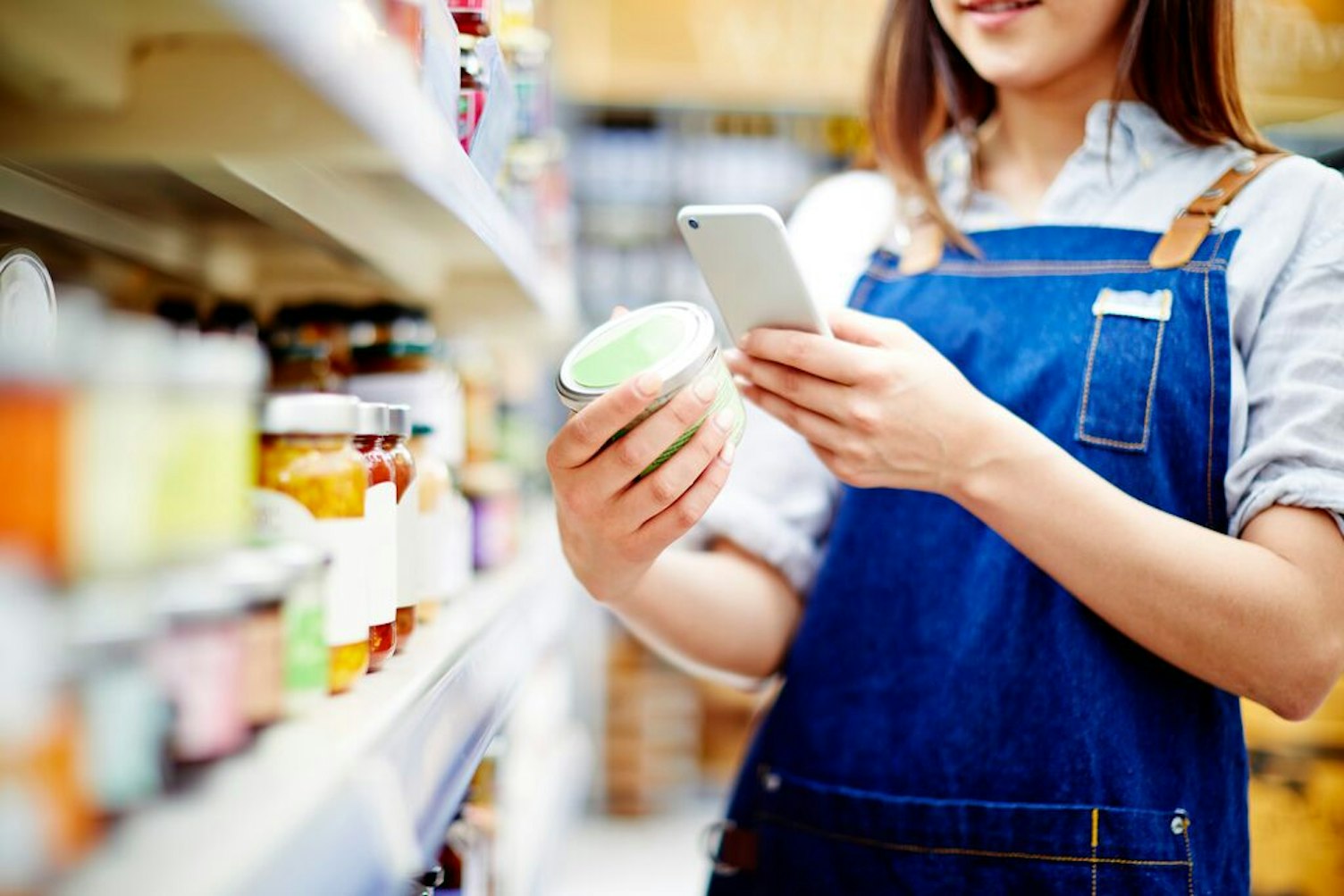 Woman Scanning Label on food Container