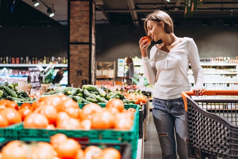 woman holding fruit
