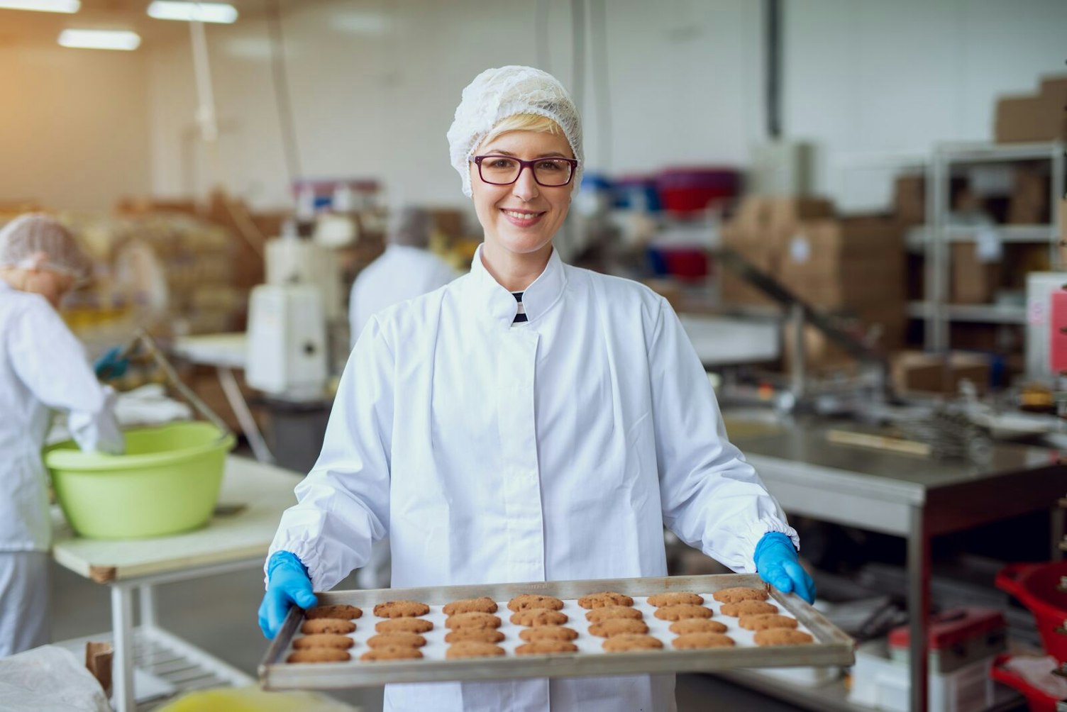 Worker in food production factory