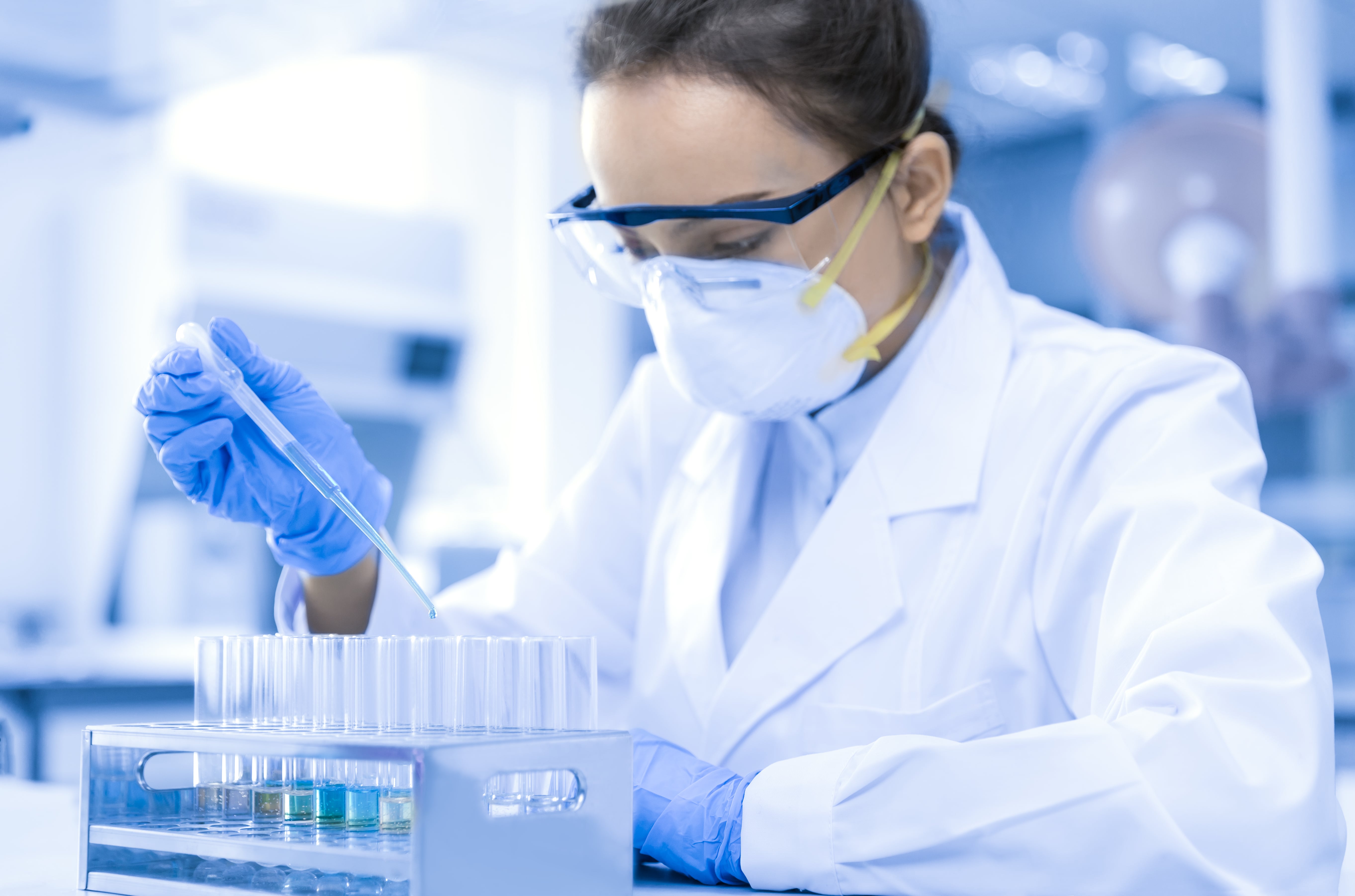 Young Female Scientist Working in the CDC Laboratory
