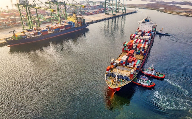 2 Cargo Container Ship Leaving Port
