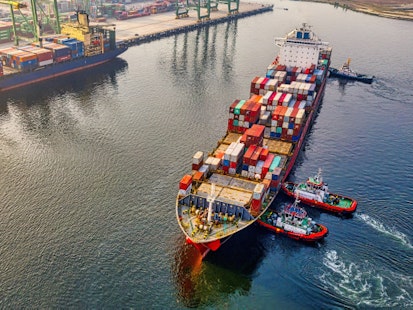 Cargo Container Ship Leaving Port