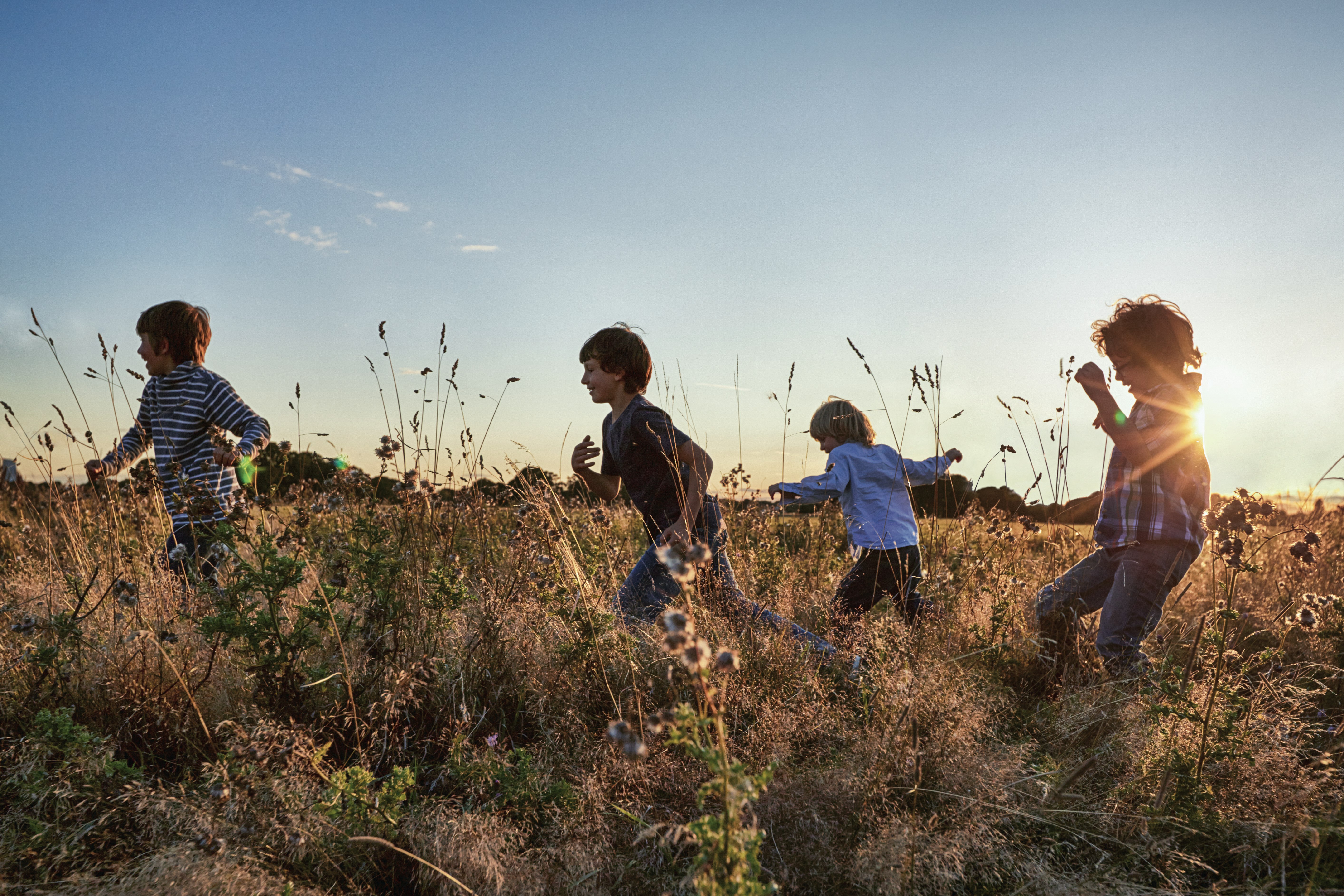 Children Running in a Field