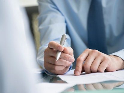 Close up on Hand Writing on a Form