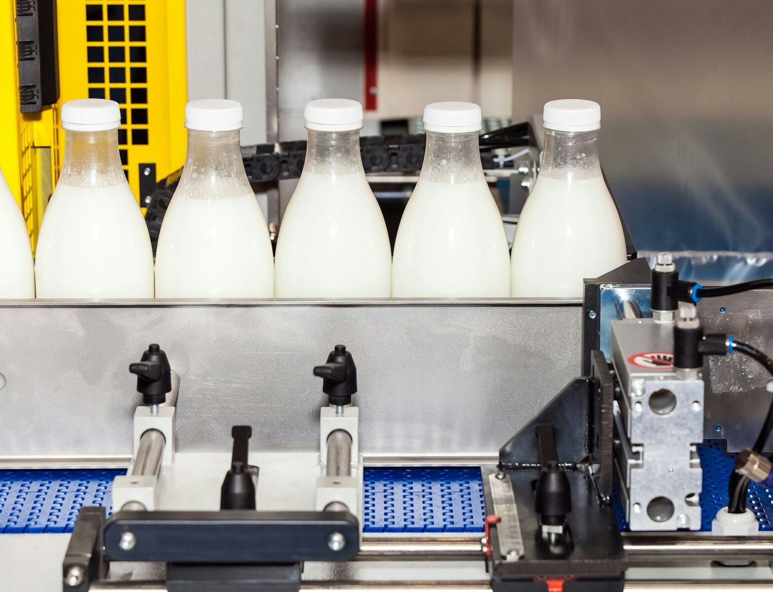Conveyor with Milk Bottles