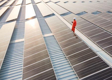 Electrician Doing Maintenance Work at a Solar Power Farm