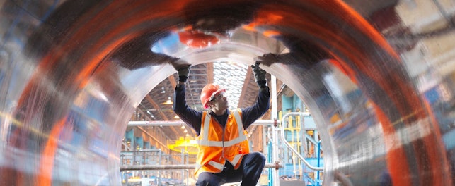 Engineer Testing Forged Steel Structure