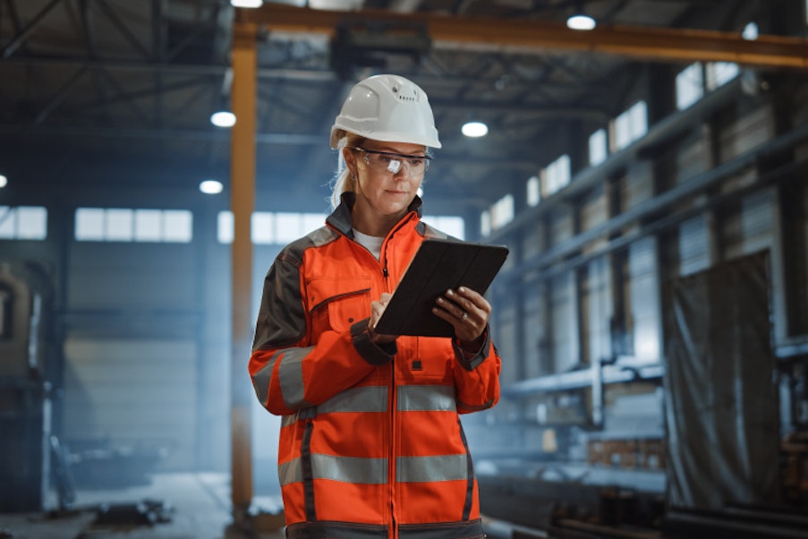 Engineer Working at a Metal Factory