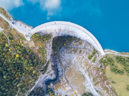 Hydroelectricity Generated from Water Dam and Reservoir Lake in Swiss Alps