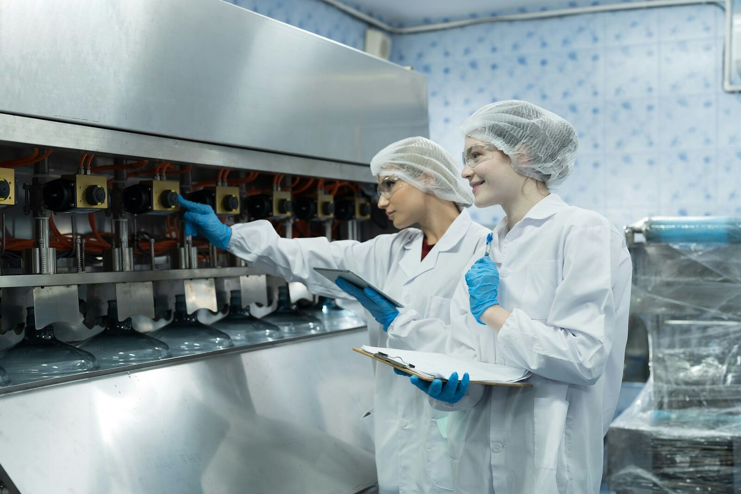Inspectors in Drinking Water Factory